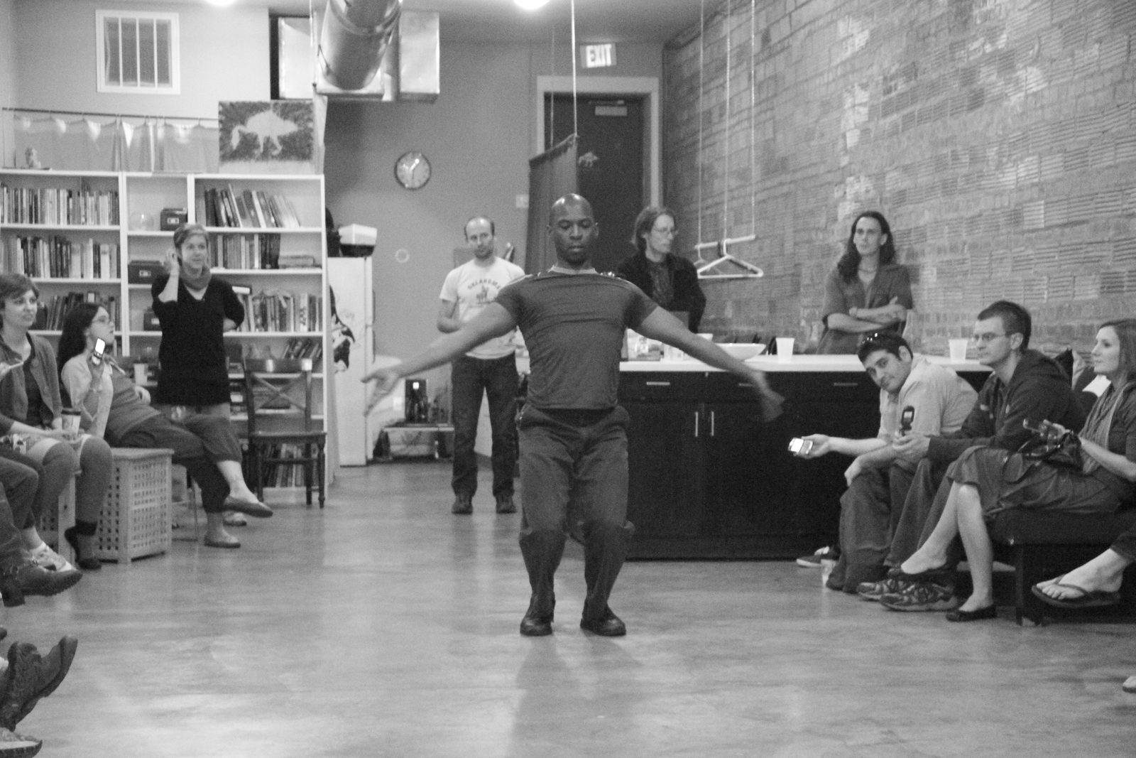 Audience around an open floor at Wild Goose Creative