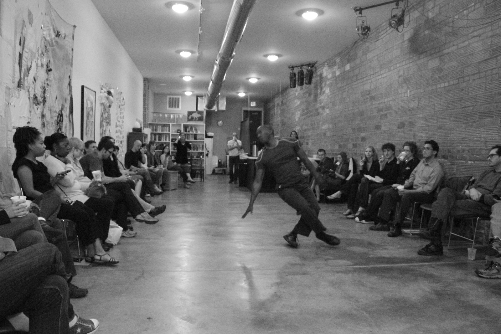 Boris Willis lunging low with one arm reaching toward the floor