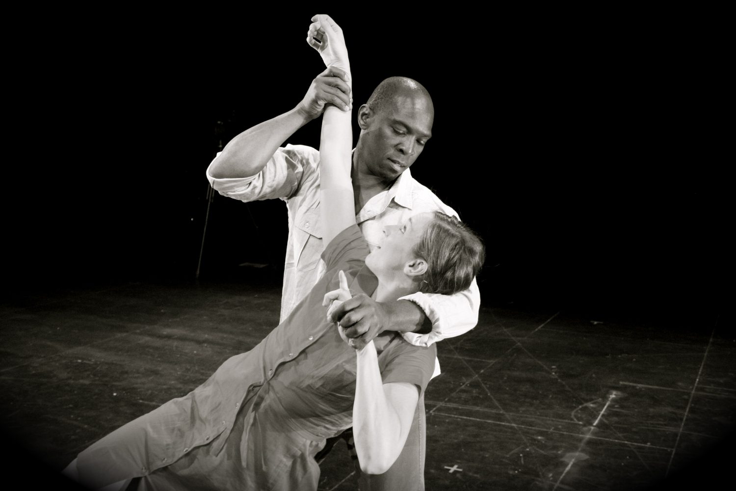 Boris Willis partnering a dancer, black and white